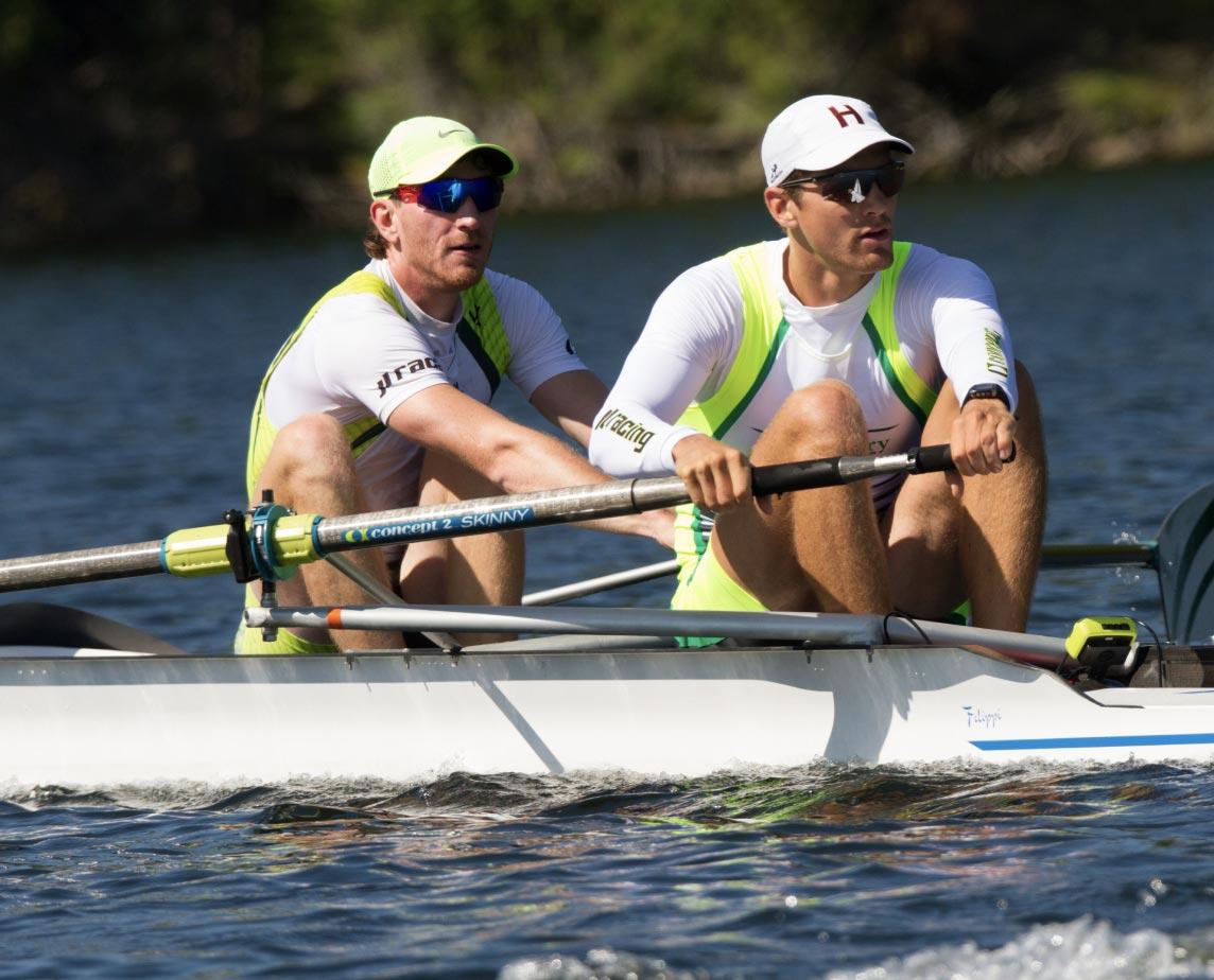 two men rowing with Concept2 sweep oars